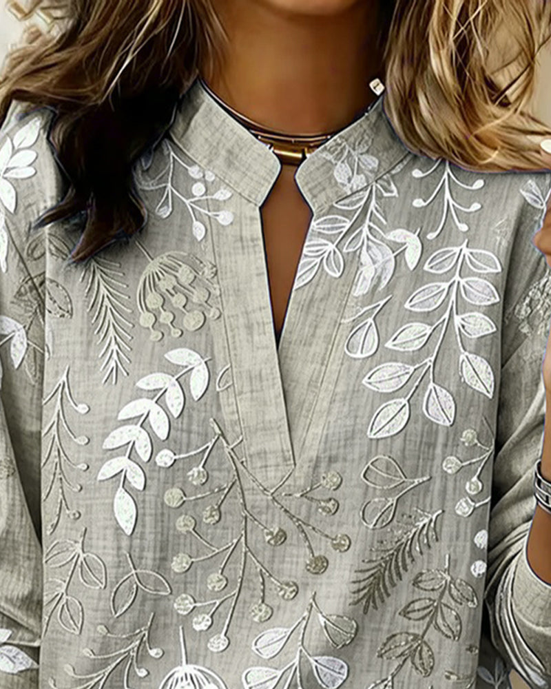 Evelina - Camicetta a fiori con collo alto