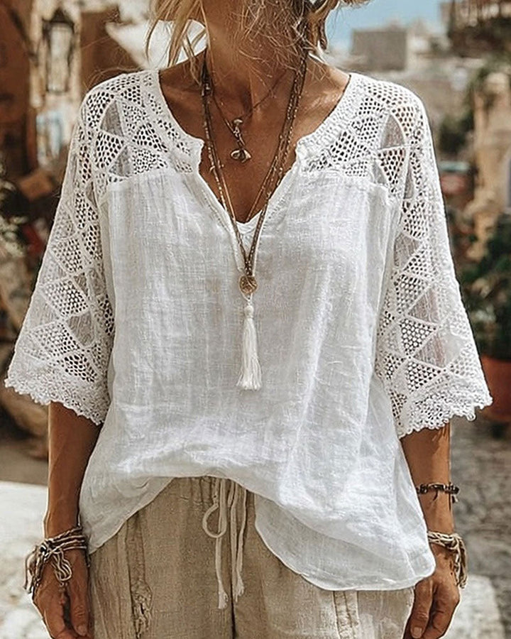 Anna | Blusa con scollo a V e dettagli in pizzo