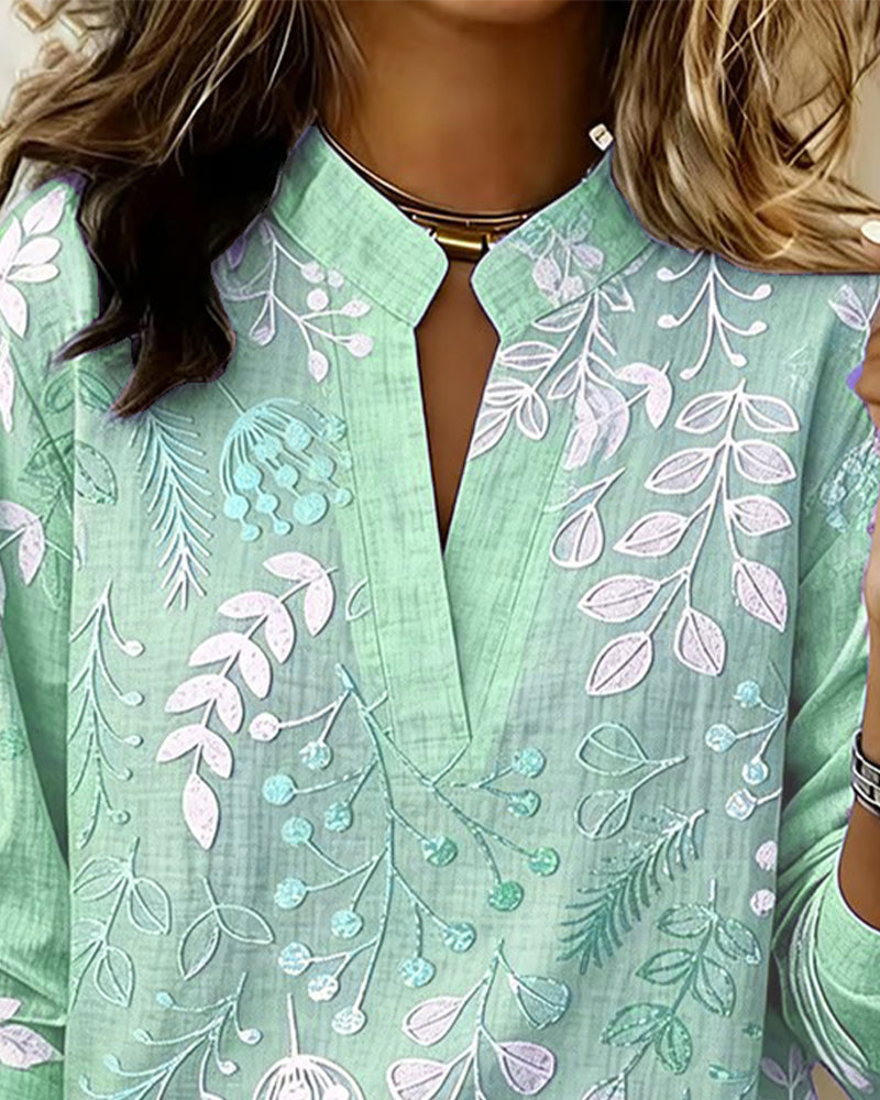 Evelina - Camicetta a fiori con collo alto