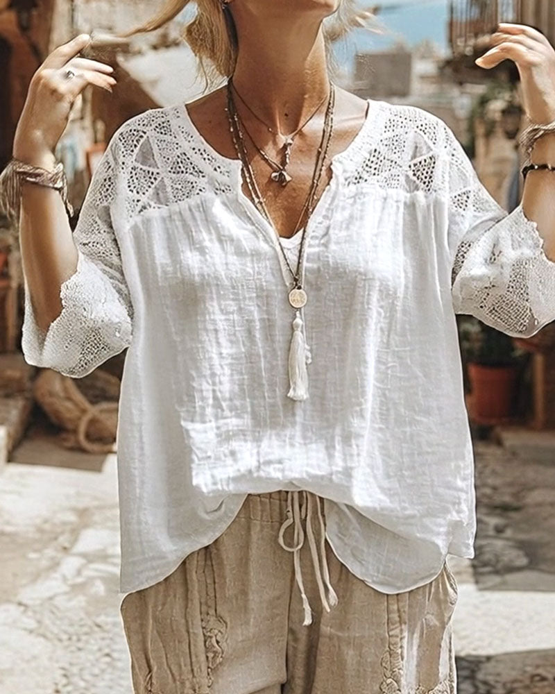Anna | Blusa con scollo a V e dettagli in pizzo