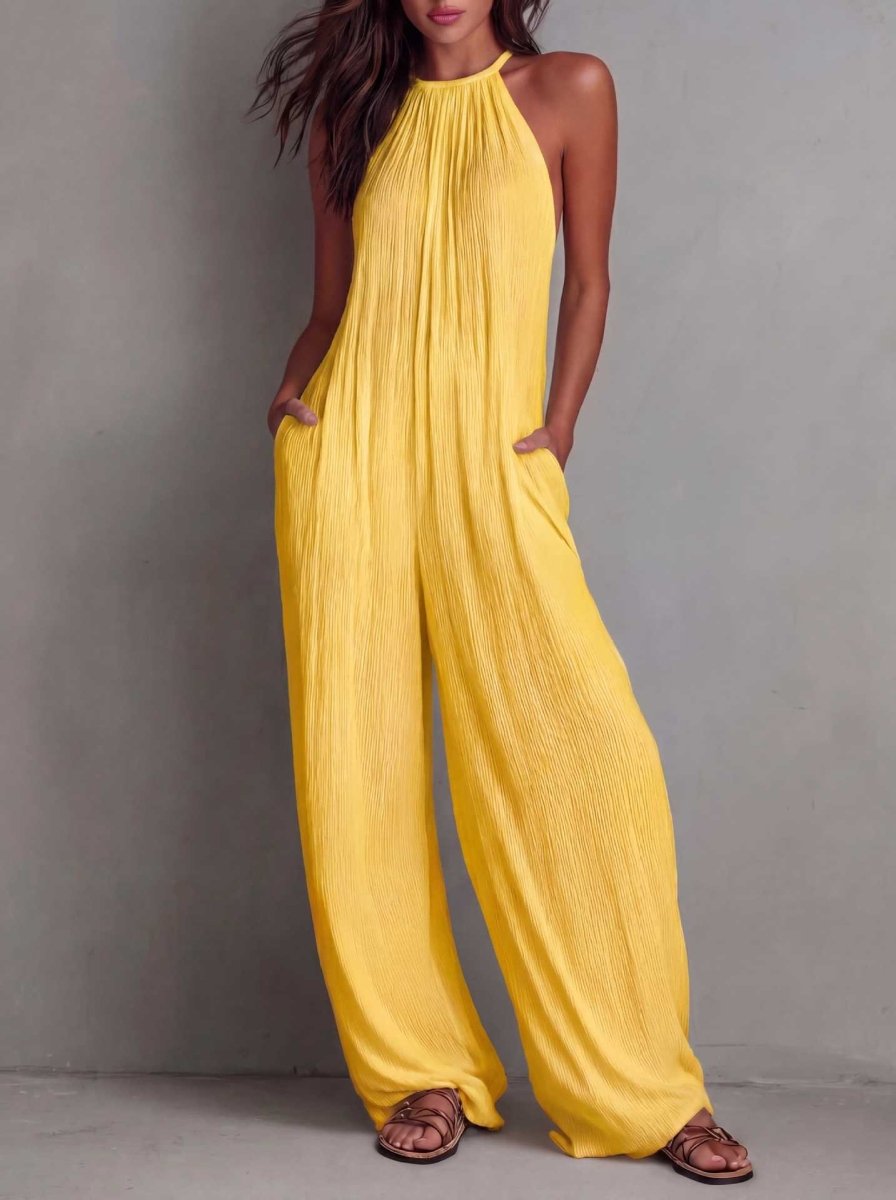 Lisa | Tuta plissettata stile resort con schiena scoperta e gamba ampia